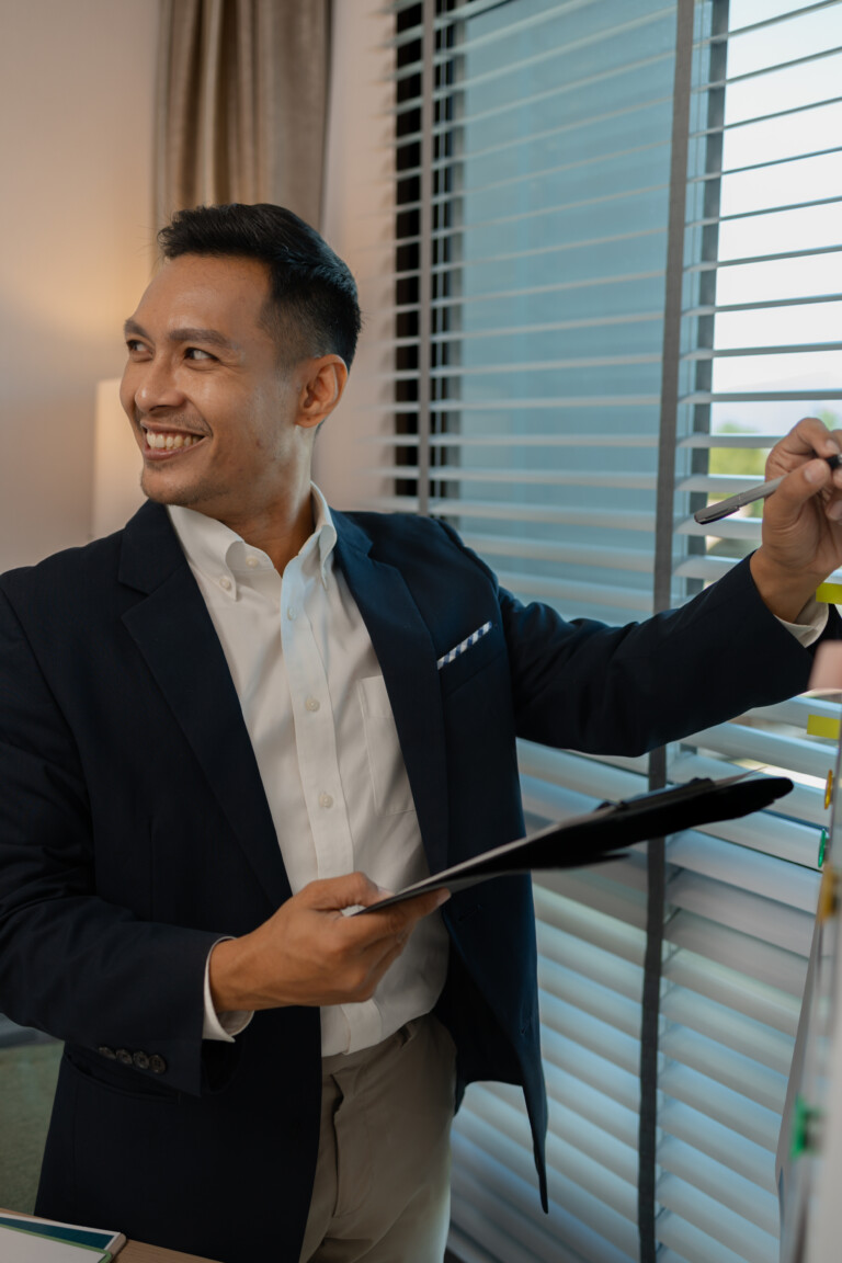 businessman giving presentation in office, an investor pitching to a room with charts and graphs showing the potential of renewable investments, presenting an accounting report